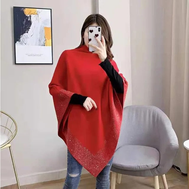 Glänzender Wollponcho